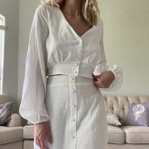 New with tag Lulus white “Rules of Romance” skirt set. Size small.